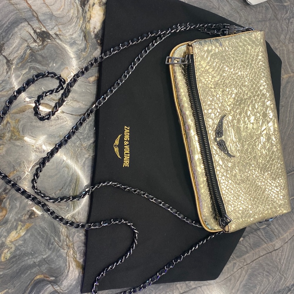 Metallic foldover chain strap bag in gold, crossbody